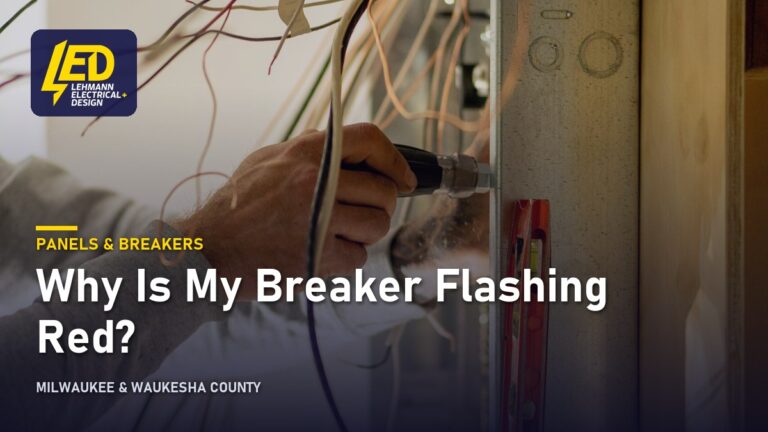 Electrician working inside an open breaker panel, titled Why Is My Breaker Flashing Red?