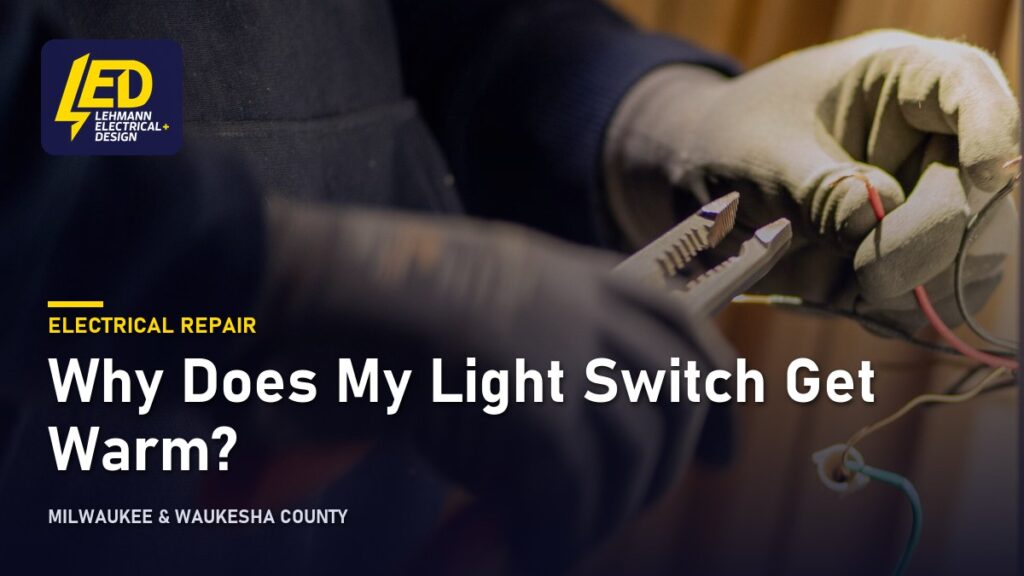 Gloved hands examining a wall-mounted electrical device, titled Why Does My Light Switch Get Warm?