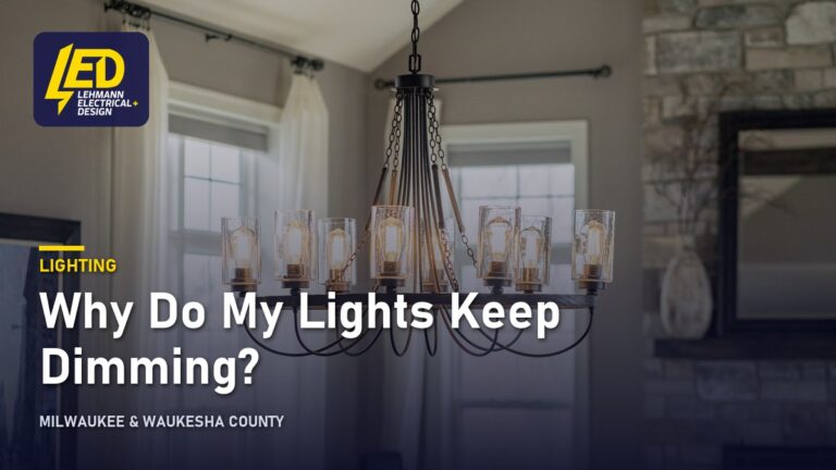 Eight-light black metal chandelier with clear glass shades in a residential living room, titled Why Do My Lights Keep Dimming?
