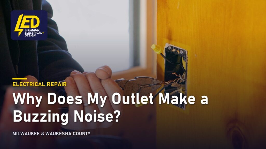 Electrician wiring an outlet box, titled Why Does My Outlet Make a Buzzing Noise?